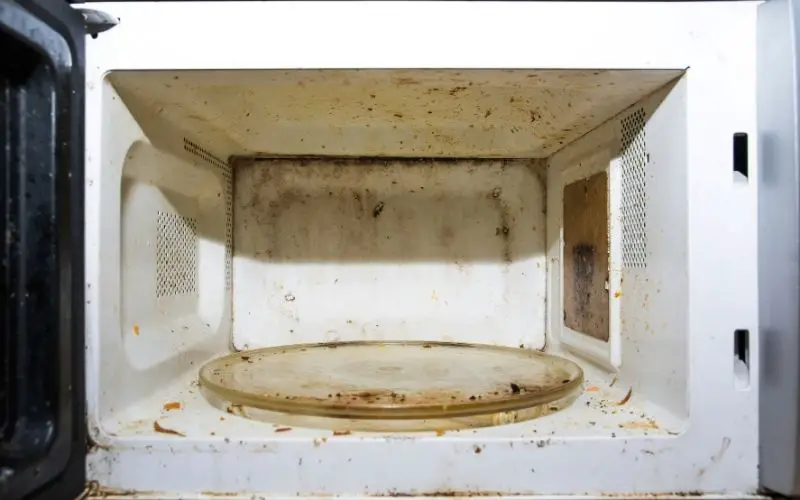 Dirty rusty microwave oven