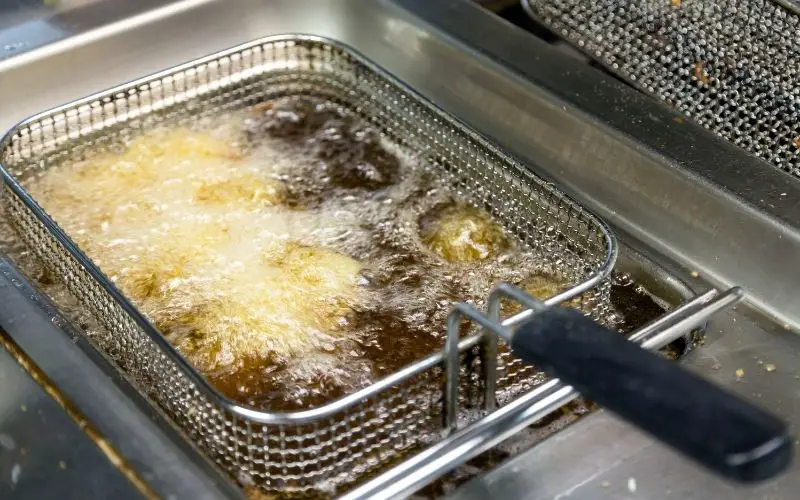 Boiling water in a deep fryer