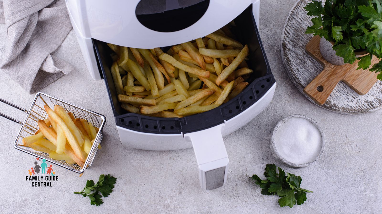 Air fryer making french fries - familyguidecentral.com