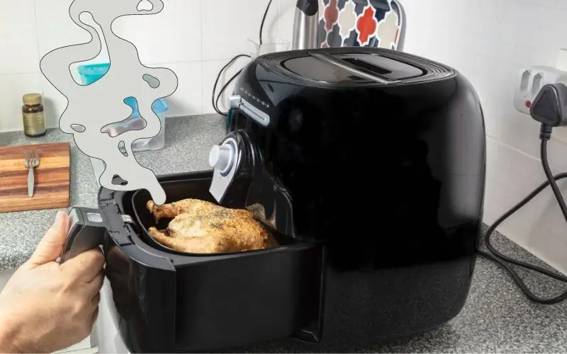 Taking basket out while air fryer cooking - Family Guide Central