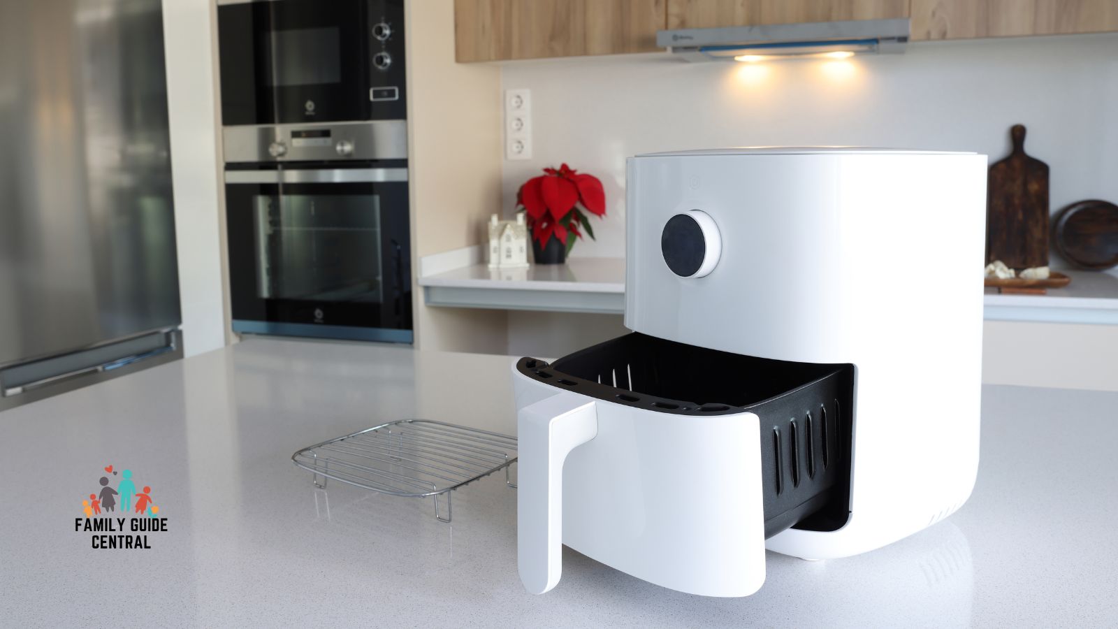 White air fryer with basket slightly out - familyguidecentral.com