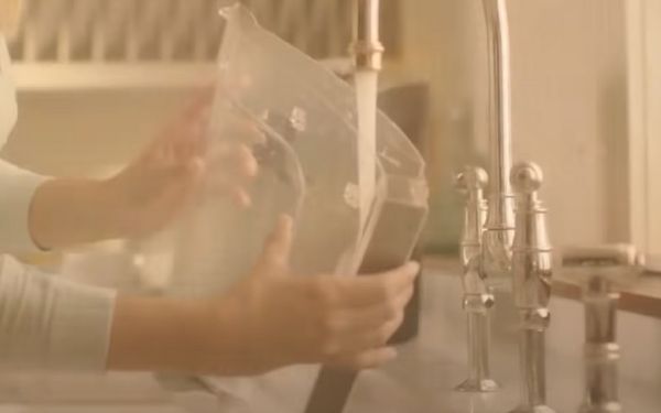 16. Rinse your reservoir under the sink - FamilyGuideCentral.com