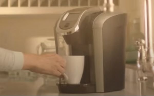 9. Place the mug on the drip tray - FamilyGuideCentral.com