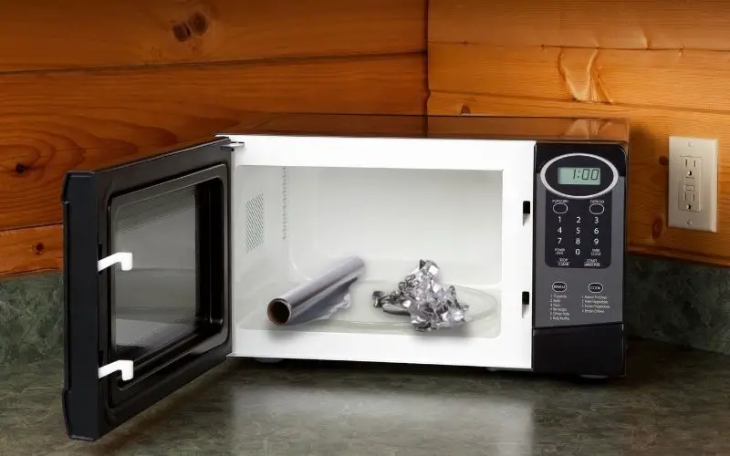 Microwave with aluminum foil inside - FamilyGuideCentral.com
