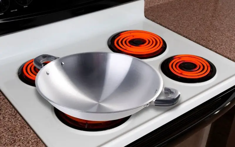 Woks on an electric stove - FamilyGuideCentral.com