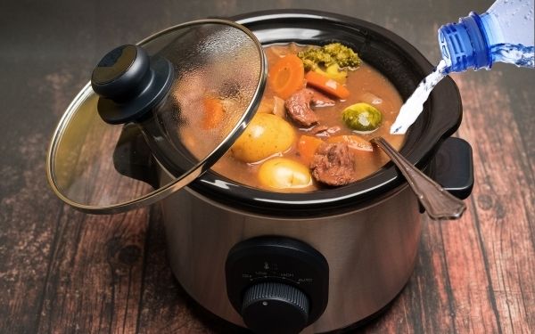 Adding water to a slow cooker - FamilyGuideCentral.com