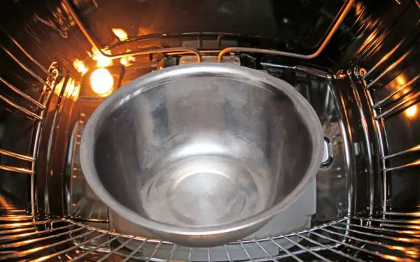Stainless steel bowl in the oven - FamilyGuideCentral.com