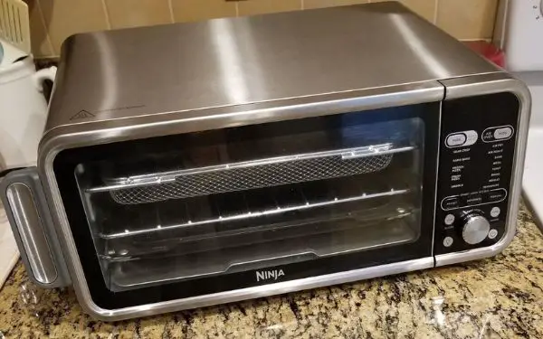Ninja Foodi Smart Dual Heat Air Fryer Oven on my counter - FamilyGuideCentral.com