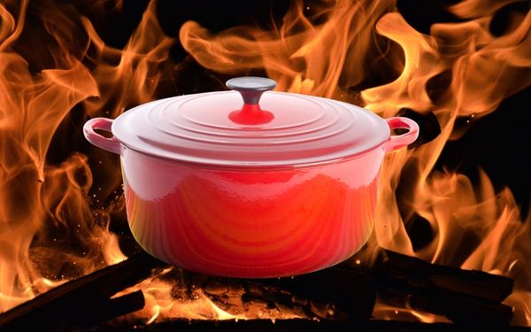 Dutch oven cooking over fire - familyguidecentral.com