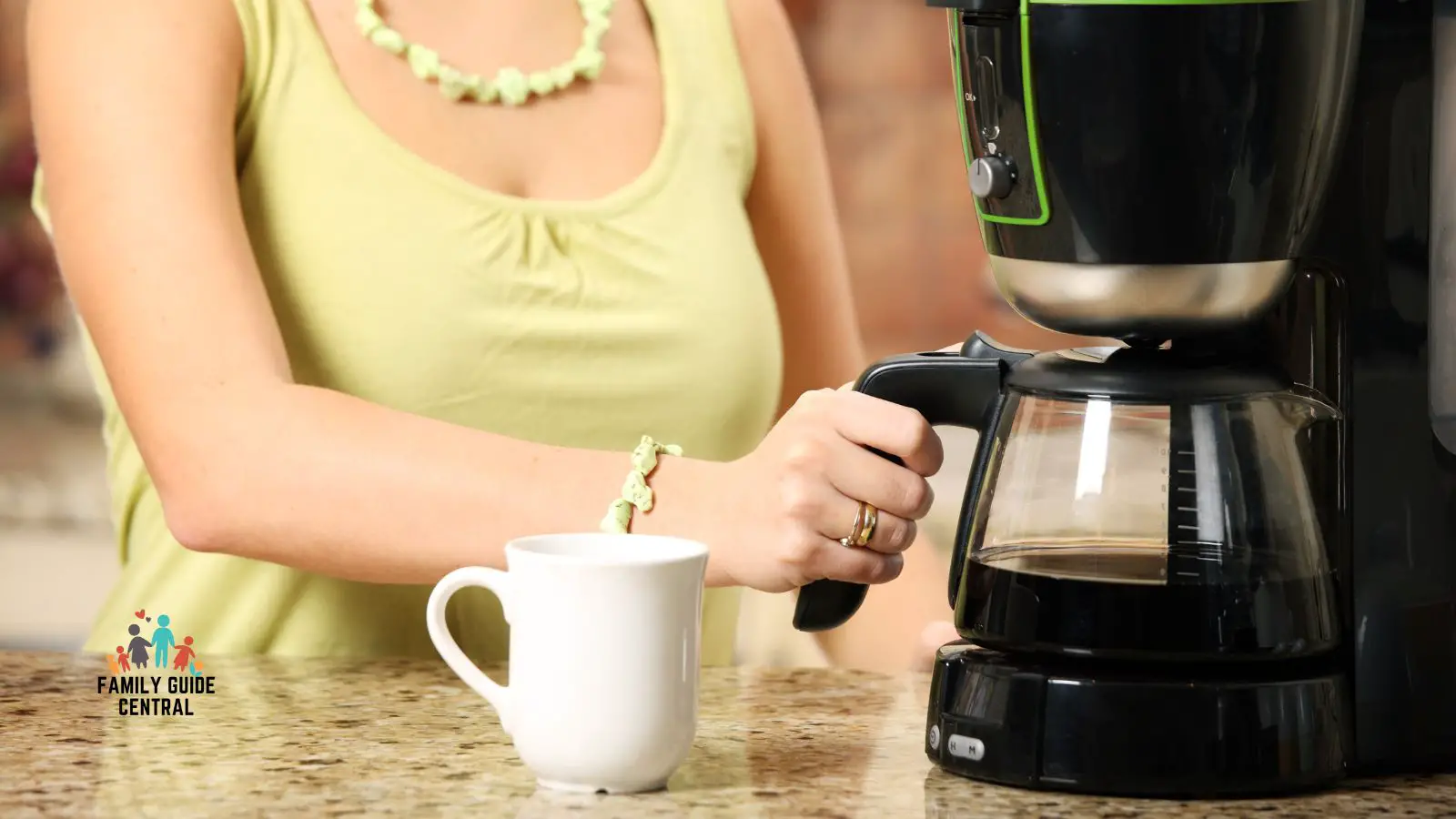 Lady making coffee in a coffee maker - familyguidecentral.com
