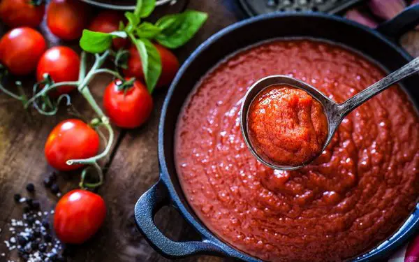 Tomato sauce on a cast iron - familyguidecentral.com