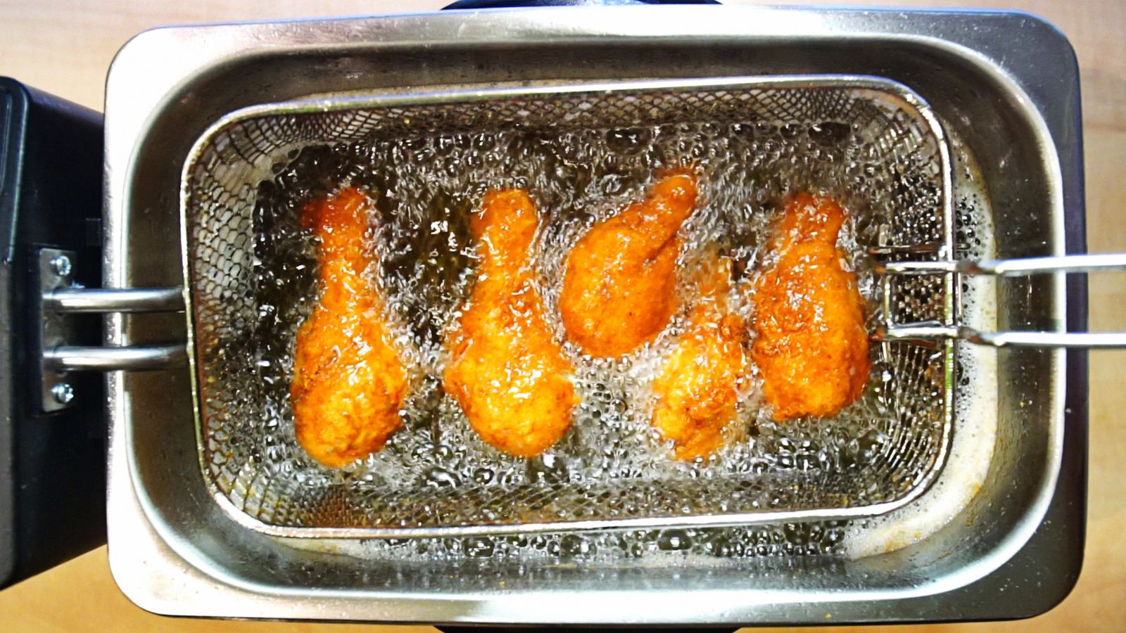 Frying raw chicken in oil and reusing it - familyguidecentral.com