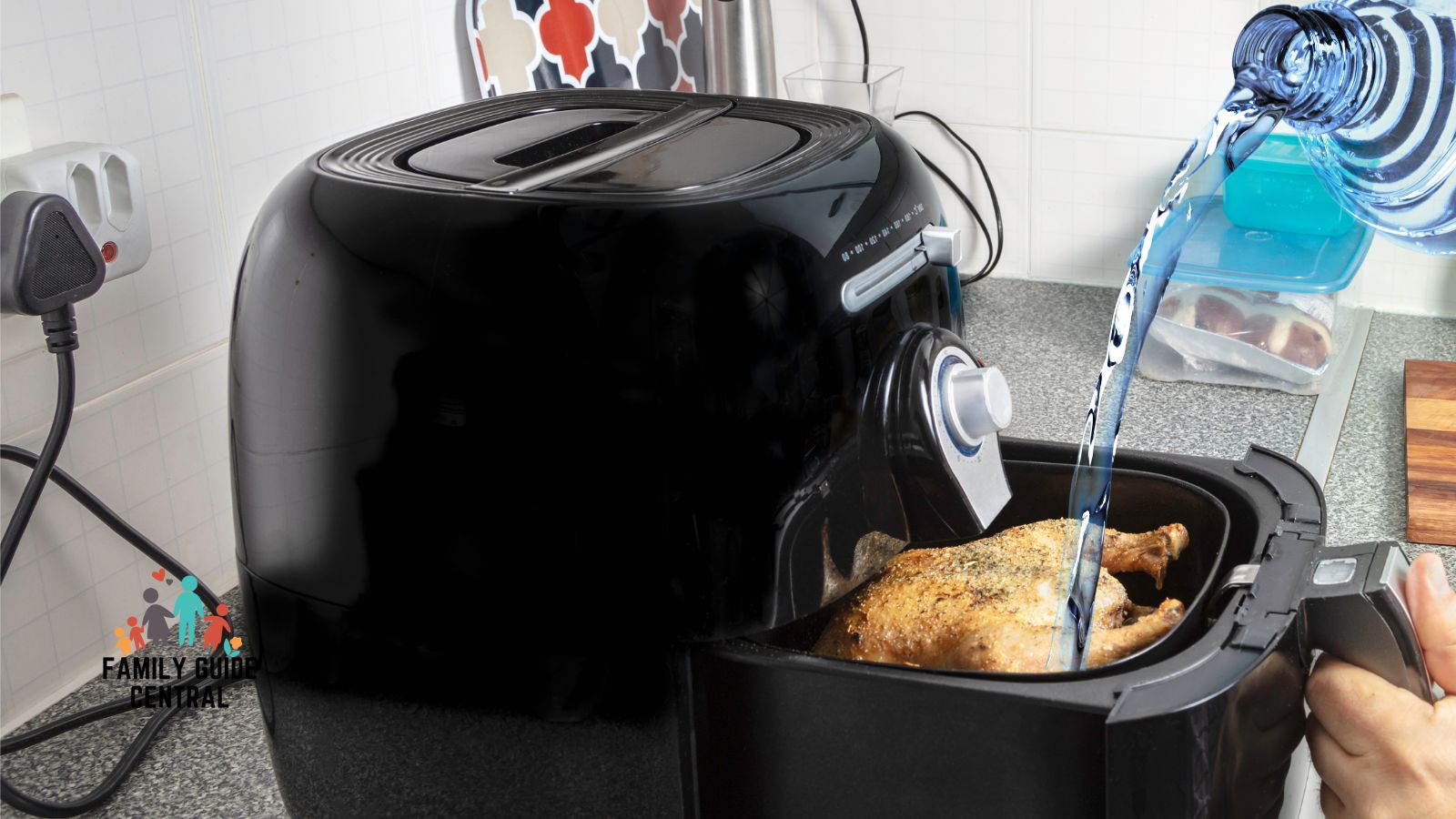 Pouring water into a air fryer - familyguidecentral.com